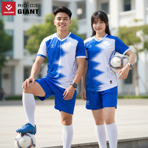 Green double couch with wooden legs