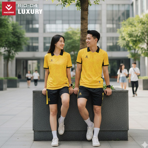 Green double couch with wooden legs