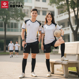 Green double couch with wooden legs