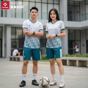 Green double couch with wooden legs