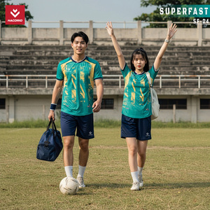 Green double couch with wooden legs