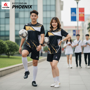 Green double couch with wooden legs