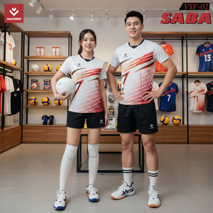 Green double couch with wooden legs