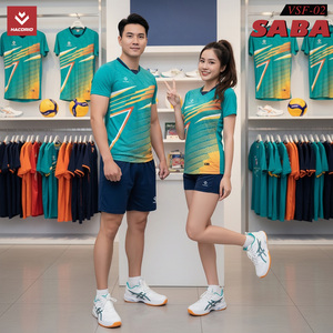 Green double couch with wooden legs