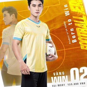 Green double couch with wooden legs