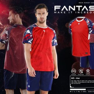 Green double couch with wooden legs