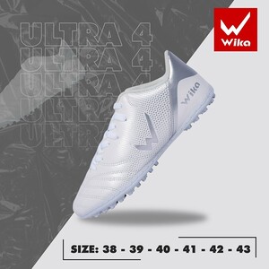 Green double couch with wooden legs