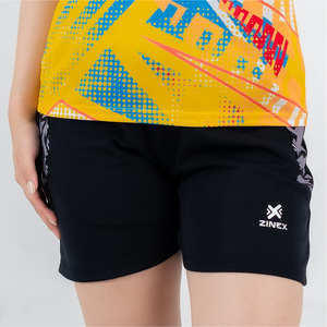 Green double couch with wooden legs