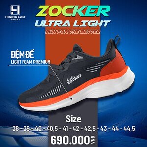 Green double couch with wooden legs