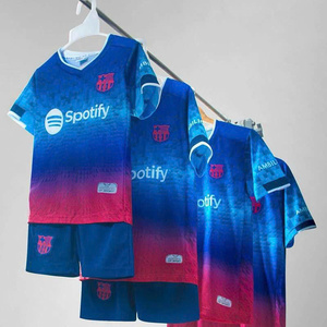 Green double couch with wooden legs