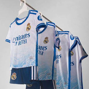 Green double couch with wooden legs