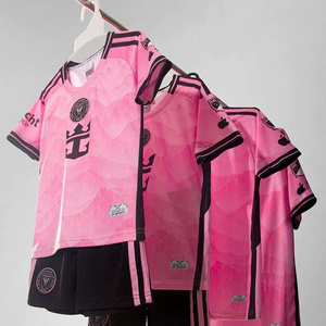 Green double couch with wooden legs