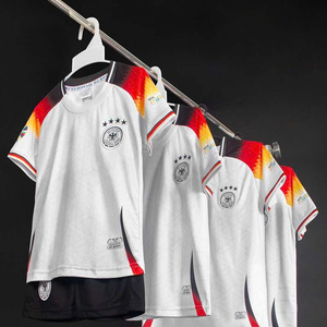 Green double couch with wooden legs