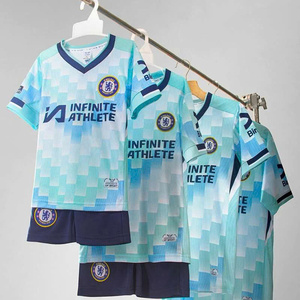 Green double couch with wooden legs