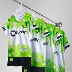 Green double couch with wooden legs