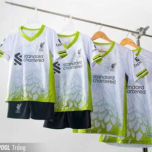 Green double couch with wooden legs