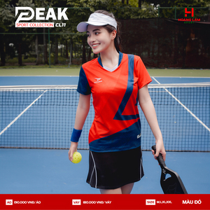 Green double couch with wooden legs