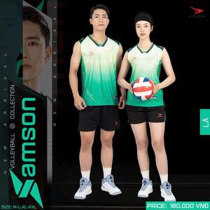 Green double couch with wooden legs