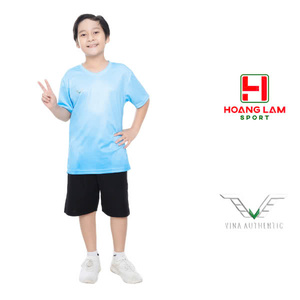 Green double couch with wooden legs