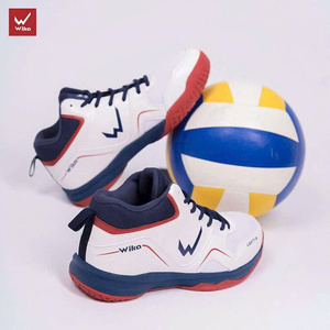 Green double couch with wooden legs