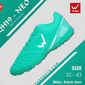 Green double couch with wooden legs