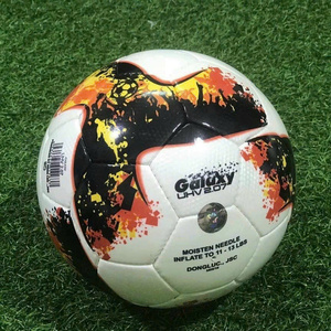 Green double couch with wooden legs