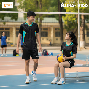 Green double couch with wooden legs