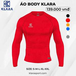 Green double couch with wooden legs