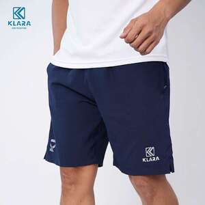 Green double couch with wooden legs