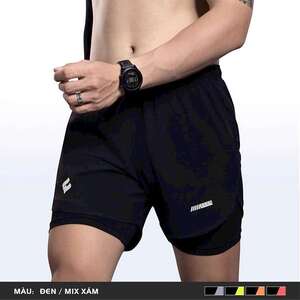 Green double couch with wooden legs