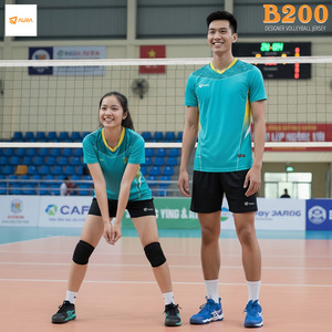 Green double couch with wooden legs