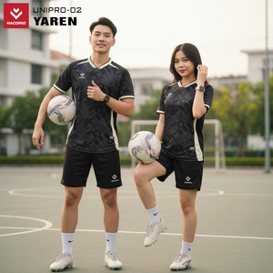 Green double couch with wooden legs