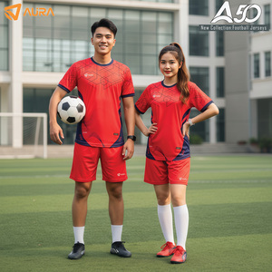 Green double couch with wooden legs