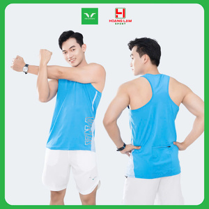 Green double couch with wooden legs