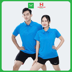 Green double couch with wooden legs