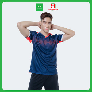 Green double couch with wooden legs