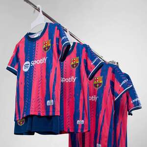 Green double couch with wooden legs