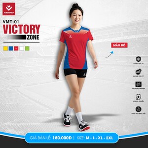 Green double couch with wooden legs