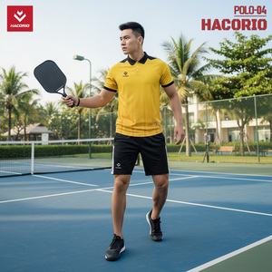 Green double couch with wooden legs