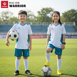 Green double couch with wooden legs