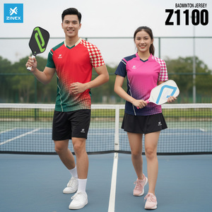 Green double couch with wooden legs