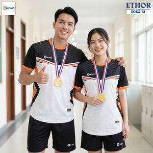 Green double couch with wooden legs