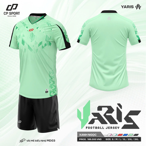 Green double couch with wooden legs