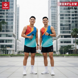 Green double couch with wooden legs