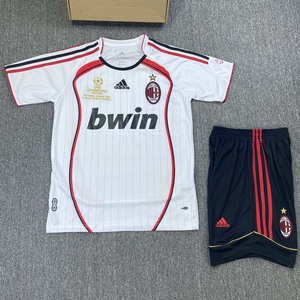 Green double couch with wooden legs