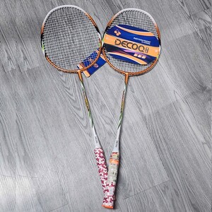 Green double couch with wooden legs