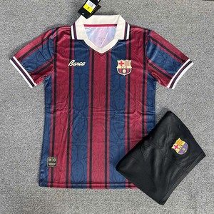 Green double couch with wooden legs