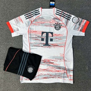 Green double couch with wooden legs