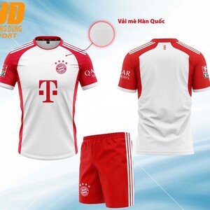 Green double couch with wooden legs