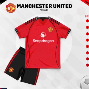 Green double couch with wooden legs